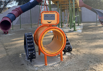 A playground with a large slide and a small orange robot.

AI generated content