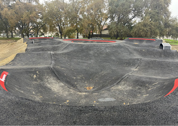 A skateboard ramp with a red and black border.

AI generated content