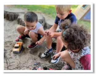 Three children are playing in the dirt, with one of them holding a toy truck.

AI generated content