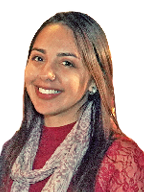 A woman wearing a red shirt and black pants.

Description generated by AI