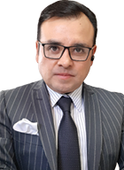A man wearing a suit and tie.

Description generated by AI