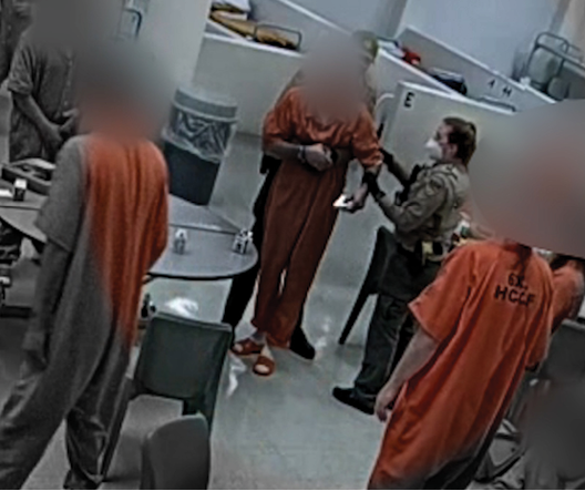 Correctional deputies saving choking inmate