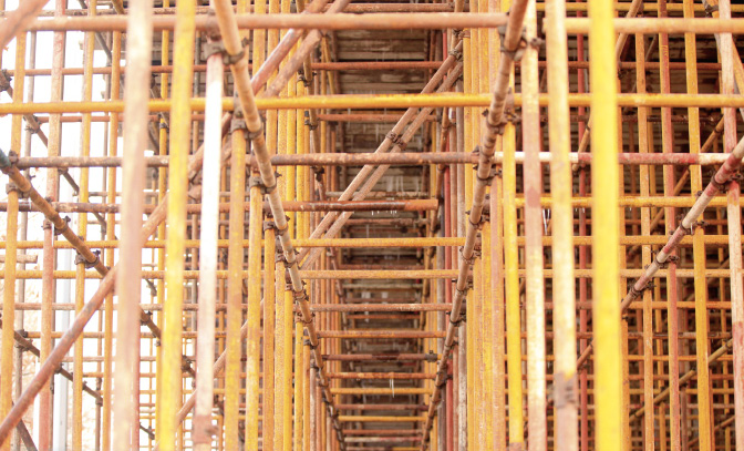 Scaffolding is on the construction site.