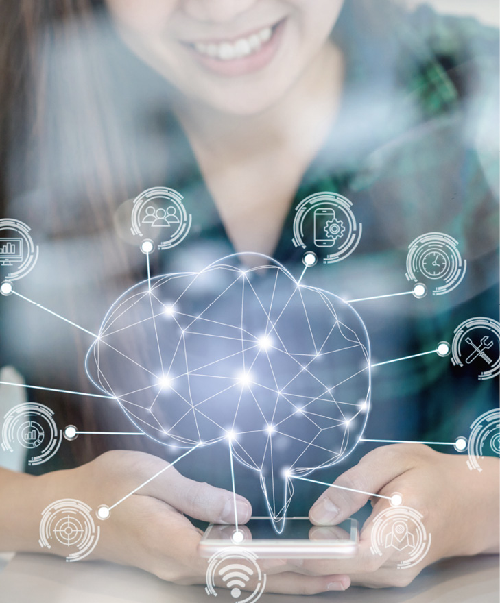 Polygonal brain shape of an artificial intelligence with various icon of smart city Internet of Things Technology over Asian businesswoman hand using the smart mobile phone,AI and business IOT concept.