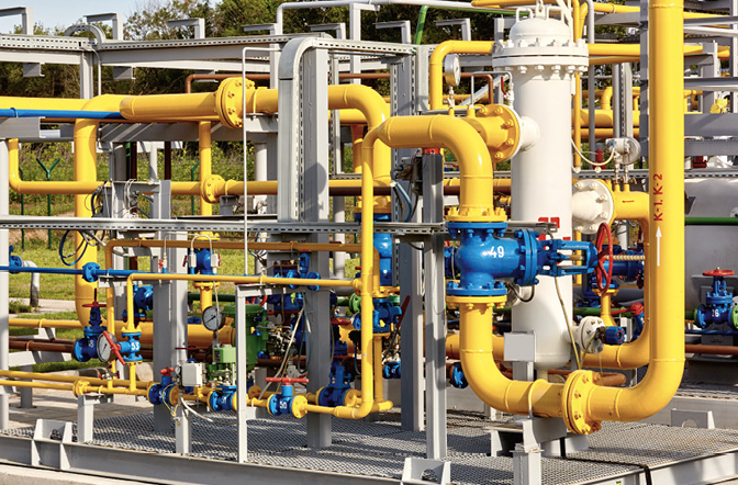 Gas industry. Pipeline and valves system at a gas production and processing plant.