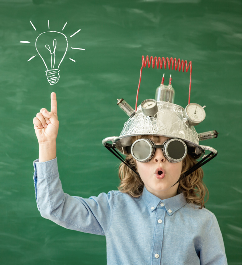 Back to school. Schoolchild with virtual reality headset. Child in class. Funny kid against blackboard. Nerd kid having fun. Geek child with VR glasses. Innovation technology and education concept.
