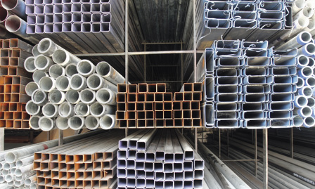 Different building materials stacked in warehouse.