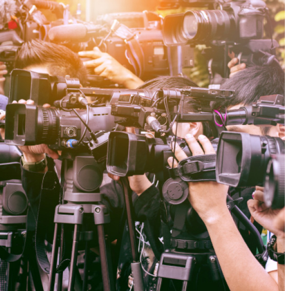 Large number of press and media reporter in broadcasting event.