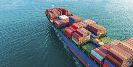 Container ship sailing through the ocean, Business logistics and transportation of International container ship in the ocean freight transportation, Aerial view Container loading cargo freight ship.