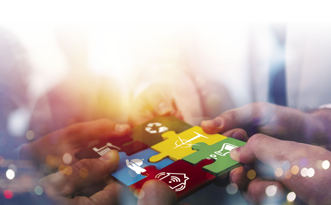 Annual Report 2019 CEN and CENELEC. On the cover, six people build a puzzle out of different pieces with different colors.